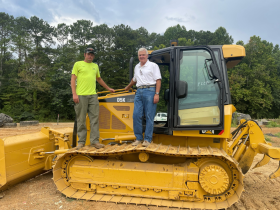 Chad Manasco & Mayor O'Mary with D5 dozier