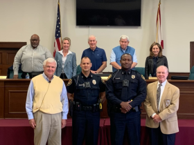 Police Officers with Mayor and Council