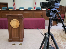 podium with camera