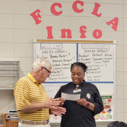 Mayor presents check to Chef Lockett