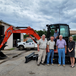 City employees with Kubota excavator