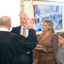 Councilmember Sam Watts reciting his Oath of Office