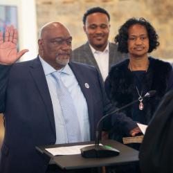 Councilmember Willie Moore III reciting his Oath of Office