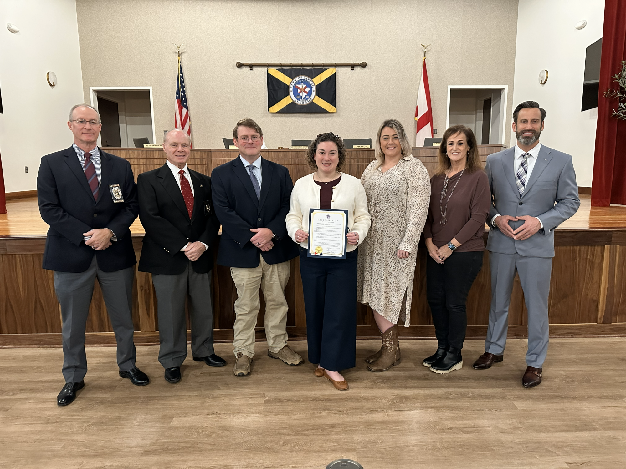 Group picture with city leadership, Asst. DA, other agencies